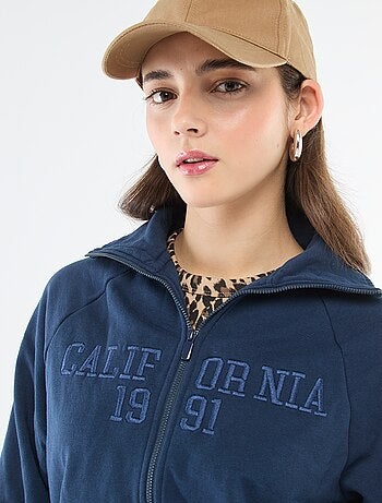 Felpa corta con zip e scritta ricamata