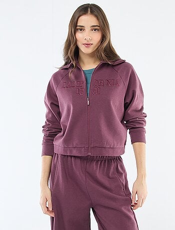 Felpa corta con zip e scritta ricamata
