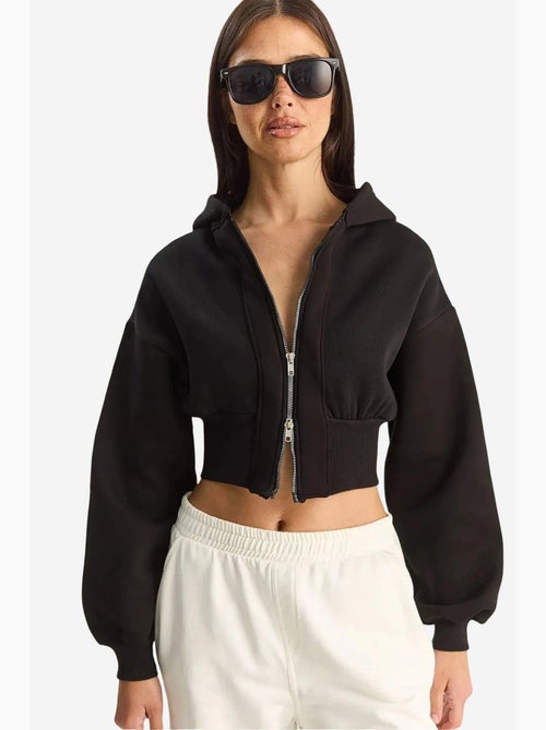 Felpa crop in maglia a coste con cappuccio, slim fit lucci - Kiabi Felpa crop in maglia a coste con cappuccio, slim fit lucci - Kiabi