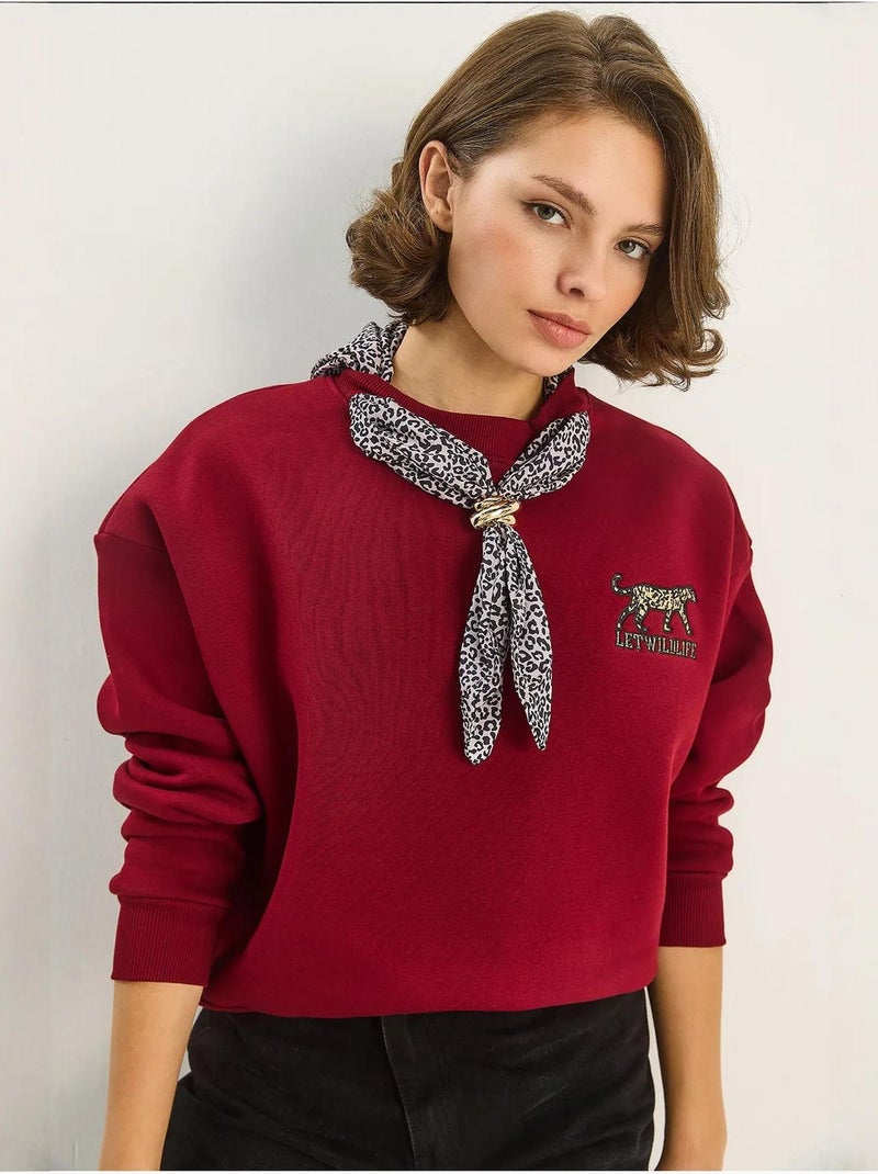 Felpa girocollo con accessorio stampato lucci Rosso bordeaux - Kiabi