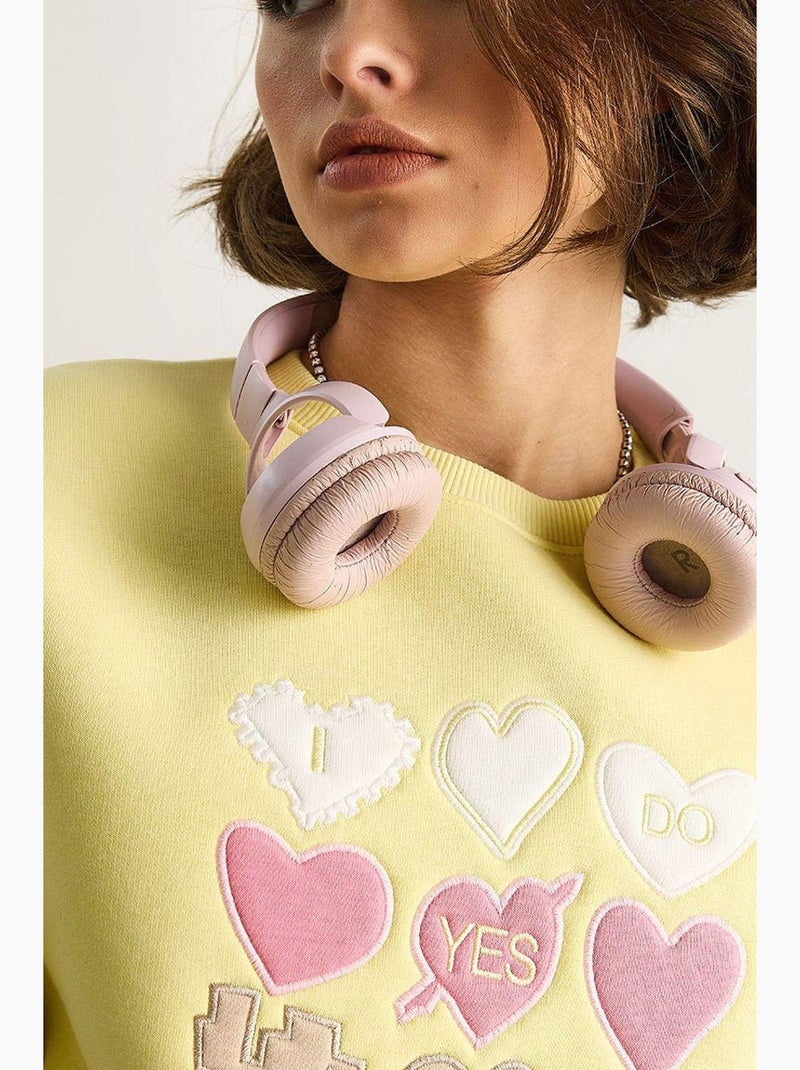 Felpa girocollo relaxed fit con applicazioni a patch a cuore lucci Giallo limone - Kiabi