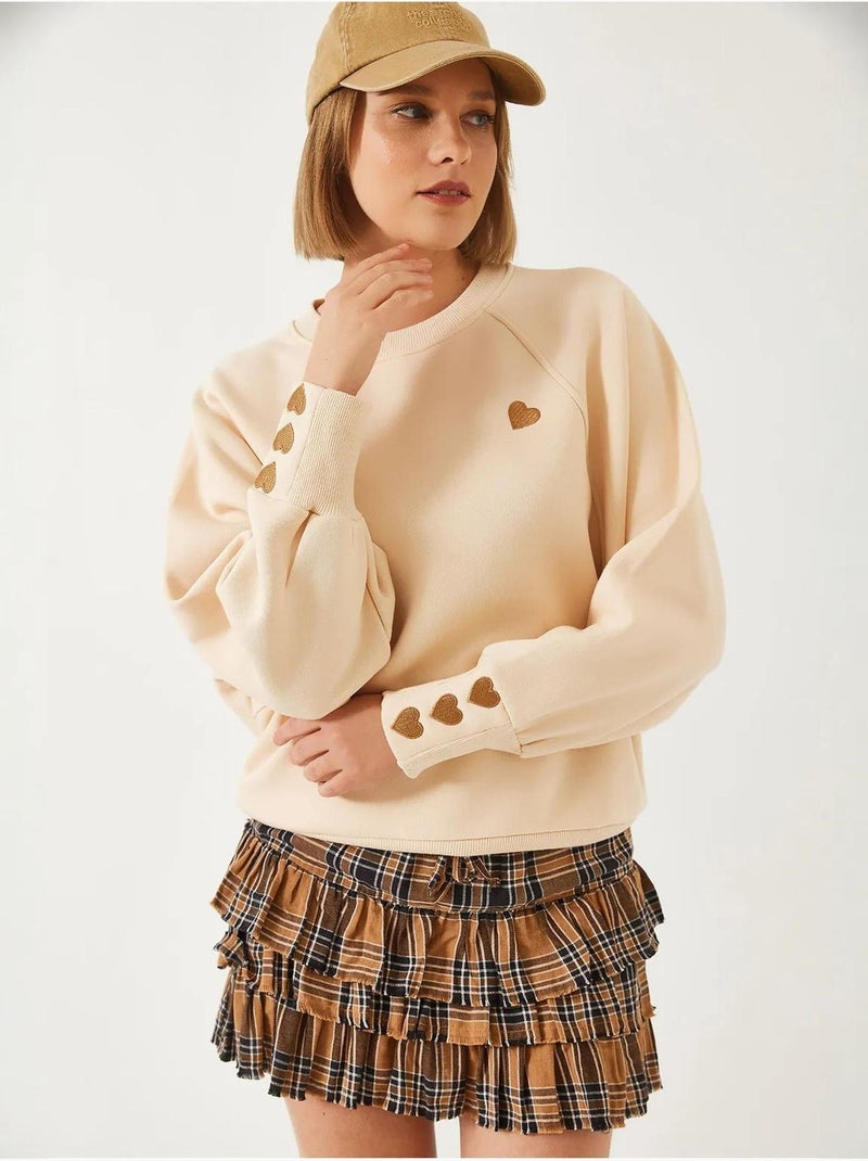 Felpa girocollo ricamata a maniche lunghe lucci Beige argilla - Kiabi