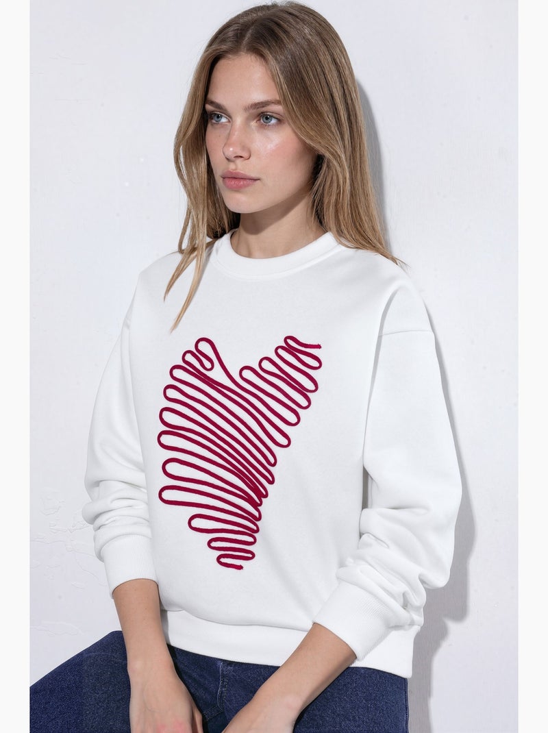 Felpa girocollo ricamata con cuore hiccup Crema - Kiabi