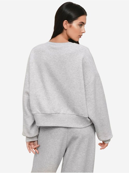 Felpa in maglia a rilievo con girocollo e vestibilità ampia hiccup - Kiabi Felpa in maglia a rilievo con girocollo e vestibilità ampia hiccup - Kiabi