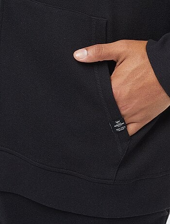 Felpa in maglia piqué con apertura con zip e cappuccio