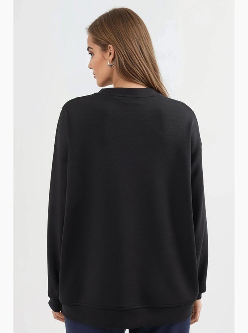 Felpa in maglia relaxed fit con girocollo busem - Kiabi Felpa in maglia relaxed fit con girocollo busem - Kiabi