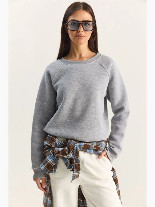 Felpa in maglia relaxed fit con girocollo lucci - Kiabi Felpa in maglia relaxed fit con girocollo lucci - Kiabi