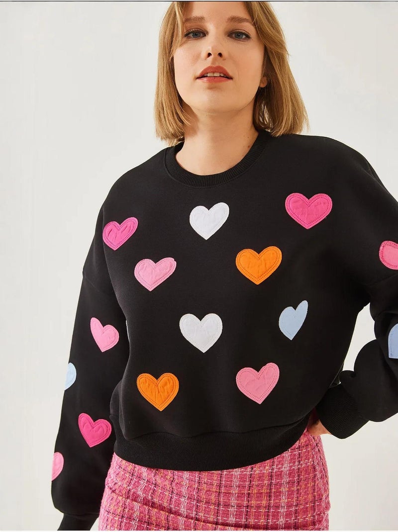Felpa in triplo filato spazzolato con ricamo a cuore bianco lucci Nero - Kiabi