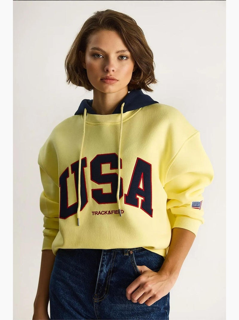 Felpa oversize con cappuccio e stampa lucci Giallo limone - Kiabi