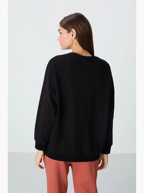 Felpa oversize con girocollo tommy - Kiabi Felpa oversize con girocollo tommy - Kiabi