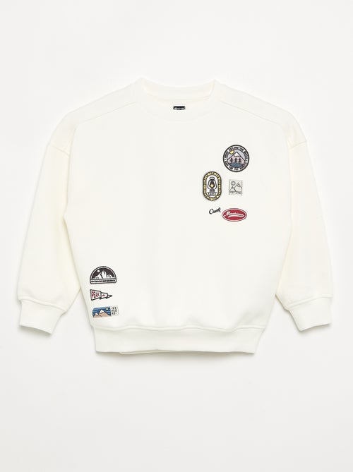 Felpa oversize con patch multipli - Kiabi Felpa oversize con patch multipli - Kiabi