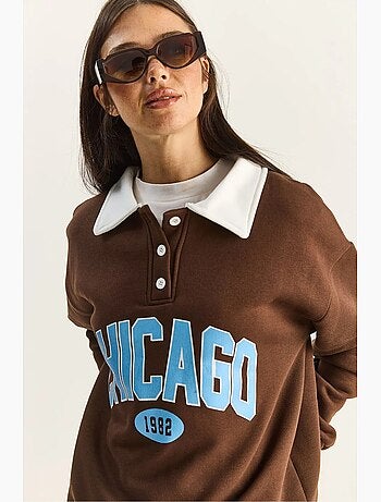 Felpa oversize con stampa lucci