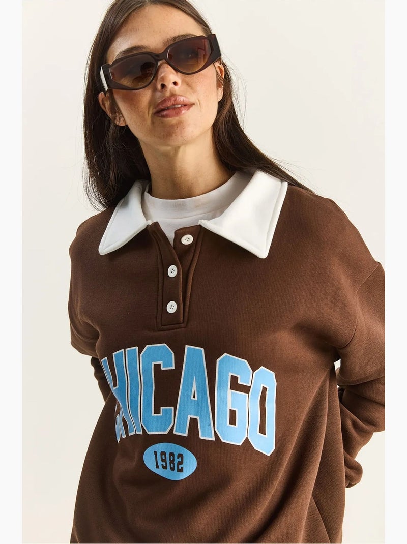Felpa oversize con stampa lucci Marrone scuro - Kiabi