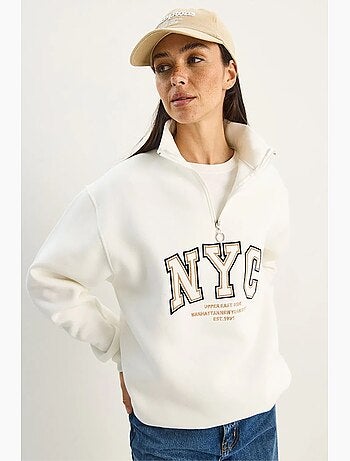Felpa oversize in maglia con collo con zip e ricamo lucci