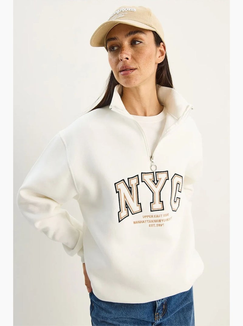 Felpa oversize in maglia con collo con zip e ricamo lucci Bianco - Kiabi