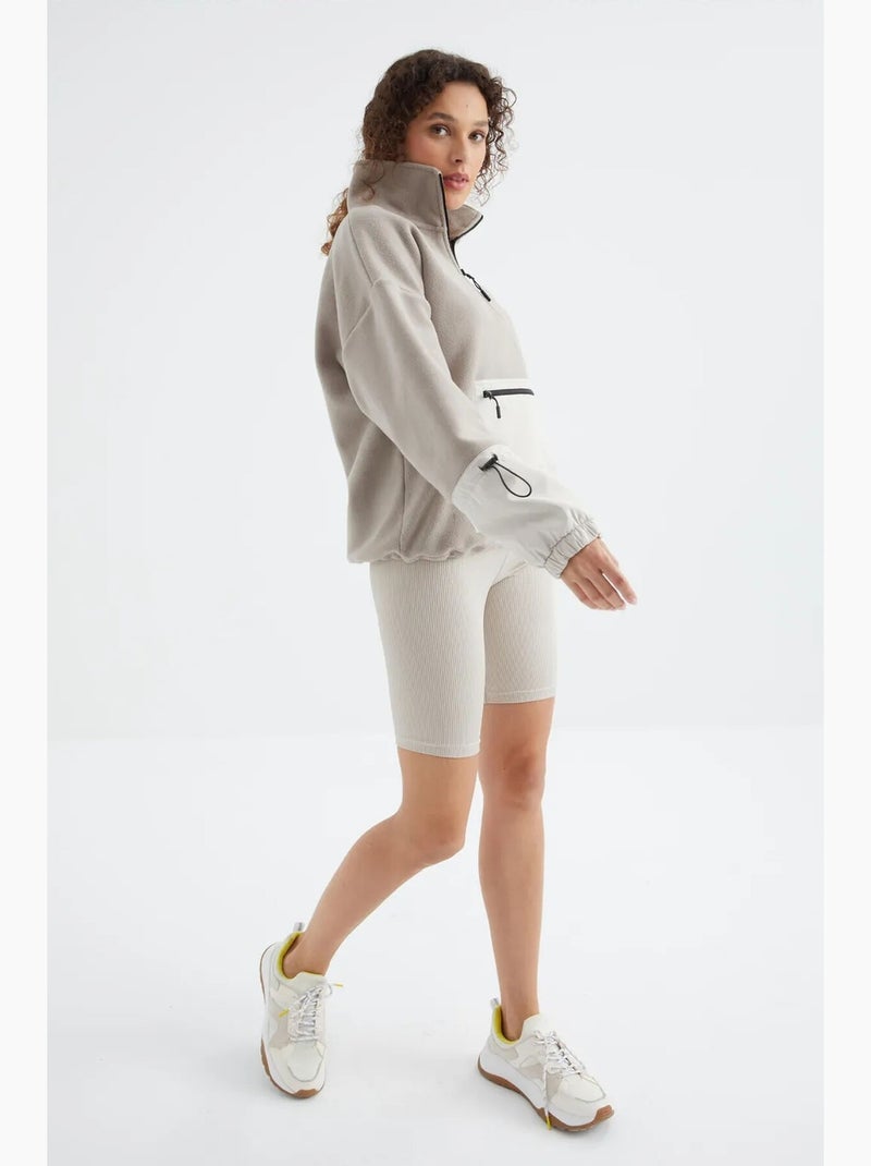 Felpa oversize in peluche con mezza zip tommy Beige/Bianco - Kiabi