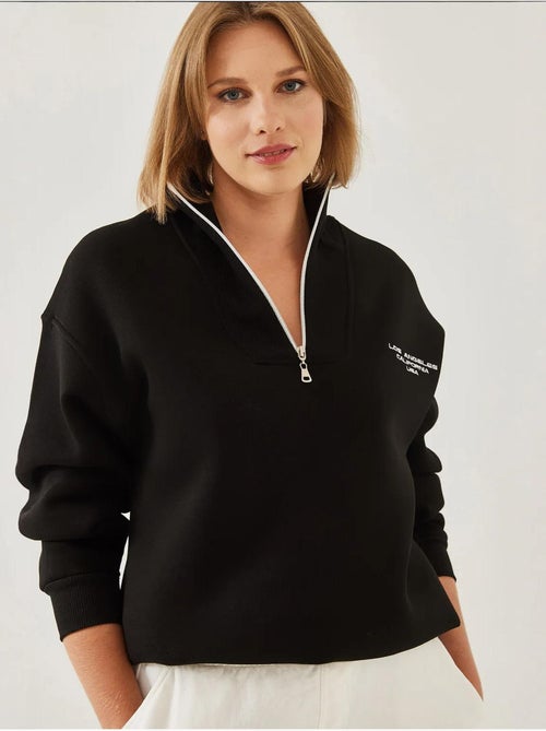 Felpa oversize spazzolata con collo alto e cerniera bianco lucci - Kiabi