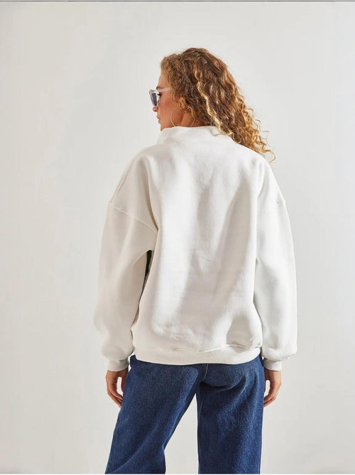 Felpa oversize stampata con zip lucci - Kiabi Felpa oversize stampata con zip lucci - Kiabi