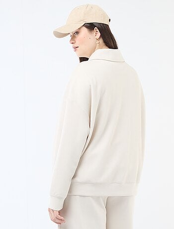 Felpa tinta unita con collo a camionista zippato