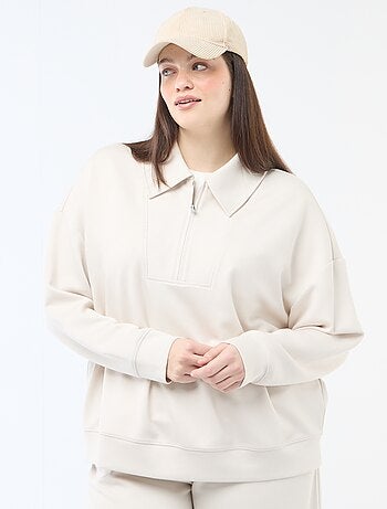 Felpa tinta unita con collo a camionista zippato