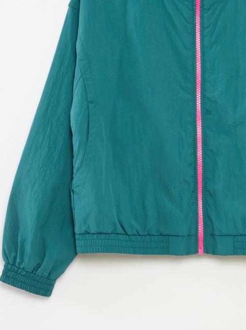 Giacca a vento con cappuccio e fondo elasticizzato - Kiabi