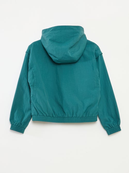 Giacca a vento con cappuccio e fondo elasticizzato - Kiabi