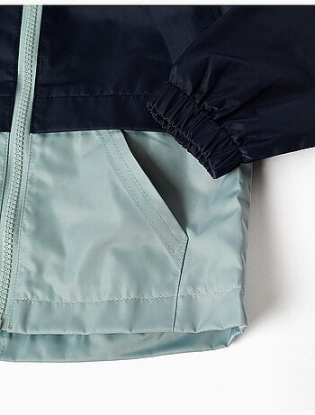 Giacca a vento con cappuccio e tasche