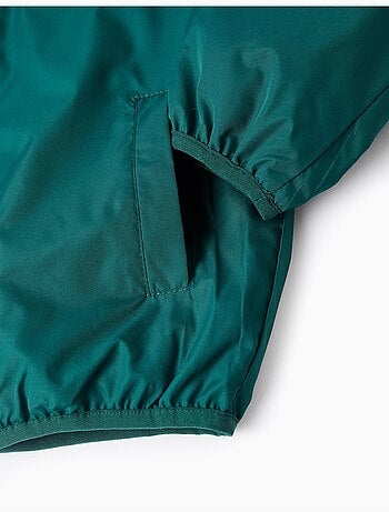 Giacca a vento con cappuccio e tasche