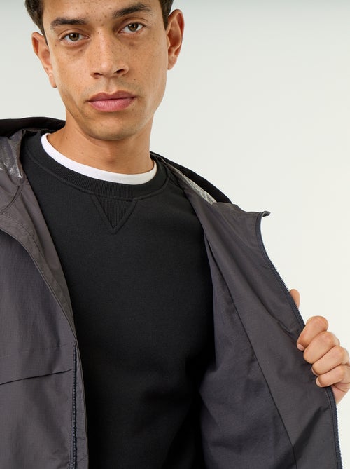 Giacca a vento con cappuccio idrorepellente - Kiabi