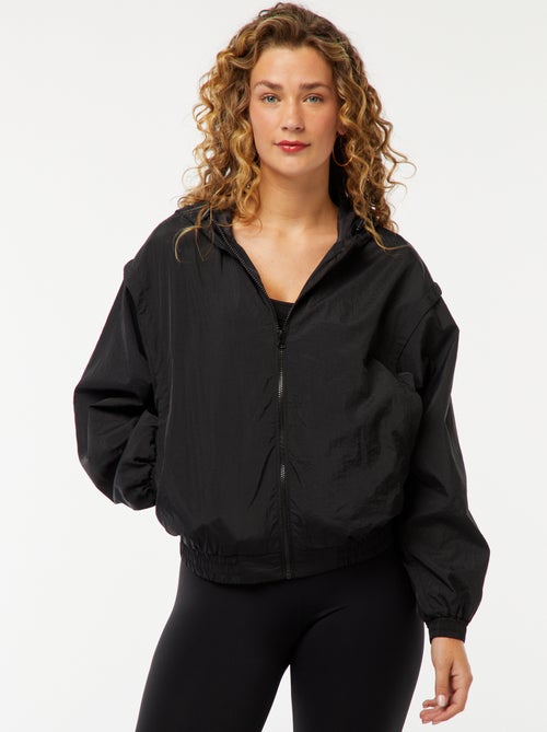 Giacca a vento con cappuccio tinta unita - Kiabi