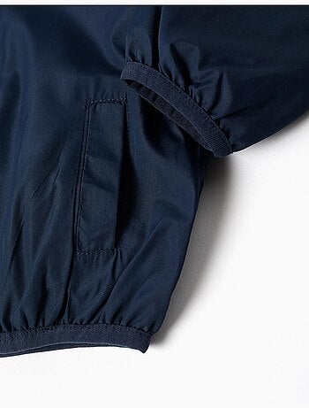 Giacca a vento con hood e tasche