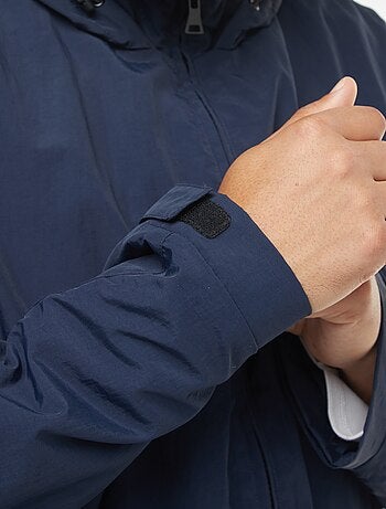 Giacca a vento impermeabile con cappuccio e maniche staccabili