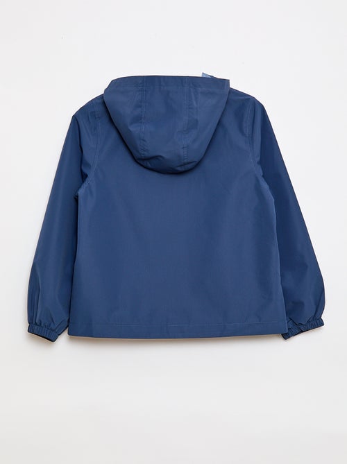 Giacca a vento tinta unita con cappuccio - Collezione facile da indossare - Kiabi