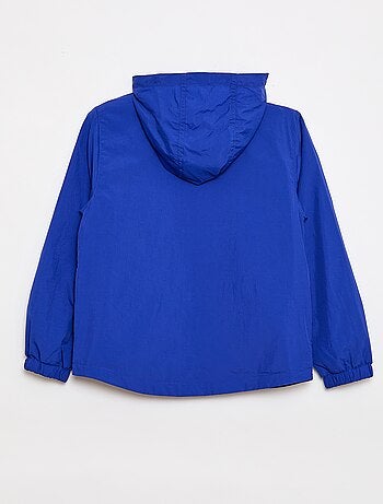 Giacca a vento tinta unita ripiegabile nel cappuccio