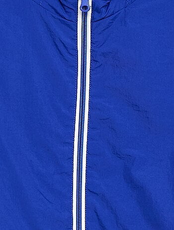 Giacca a vento tinta unita ripiegabile nel cappuccio