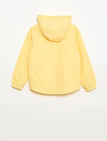 Giacca a vento tinta unita ripiegabile nel cappuccio