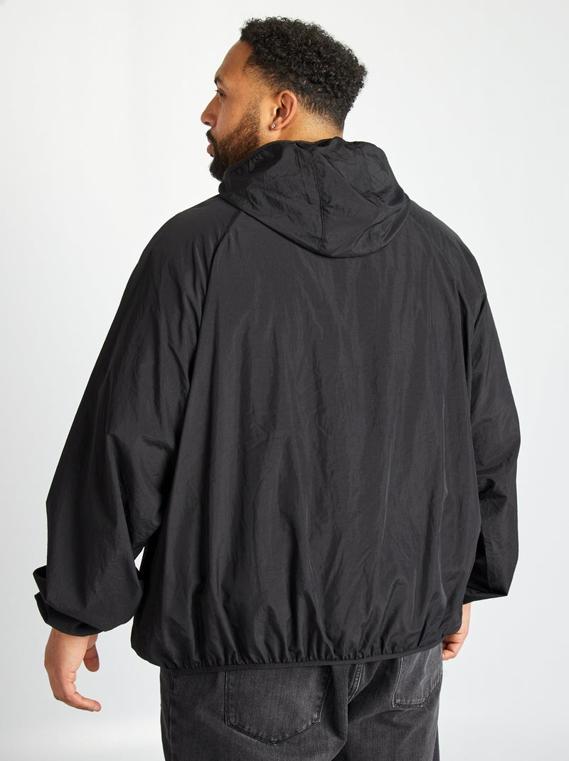 Giacca a vento tinta unita ripiegabile nel cappuccio nero - Kiabi