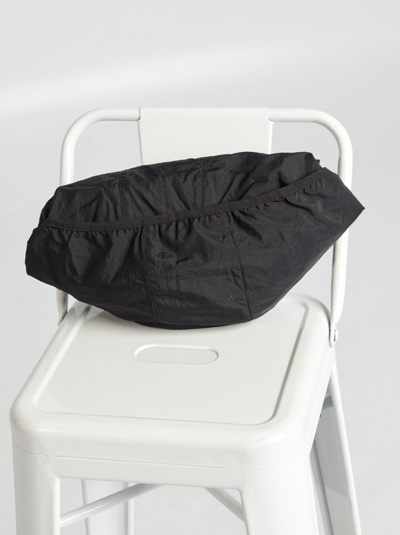 Giacca a vento tinta unita ripiegabile nel cappuccio nero - Kiabi