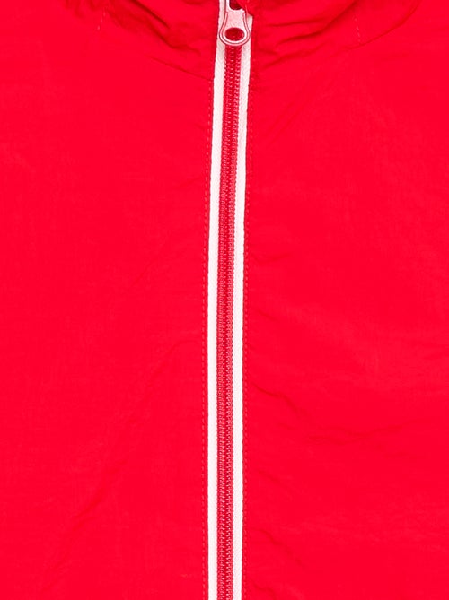 Giacca a vento unita pieghevole nel cappuccio - Kiabi