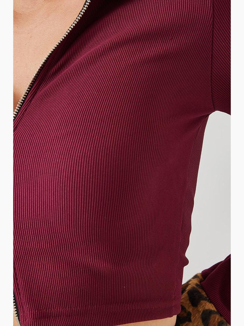 Giacca con cerniera in peluche leopardato lucci Rosso bordeaux - Kiabi
