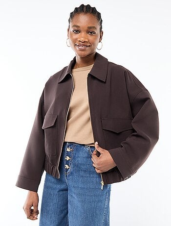 Giacca con zip e tasche applicate tinta unita