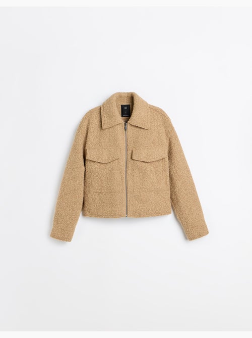 Giacca corta con effetto bouclé, mo fashion - Kiabi Giacca corta con effetto bouclé, mo fashion - Kiabi