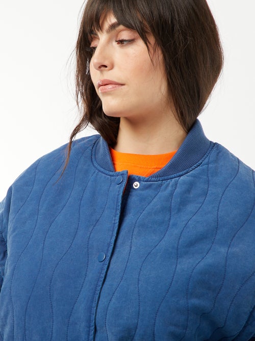 Giacca imbottita in cotone con onde verticali - Kiabi Giacca imbottita in cotone con onde verticali - Kiabi