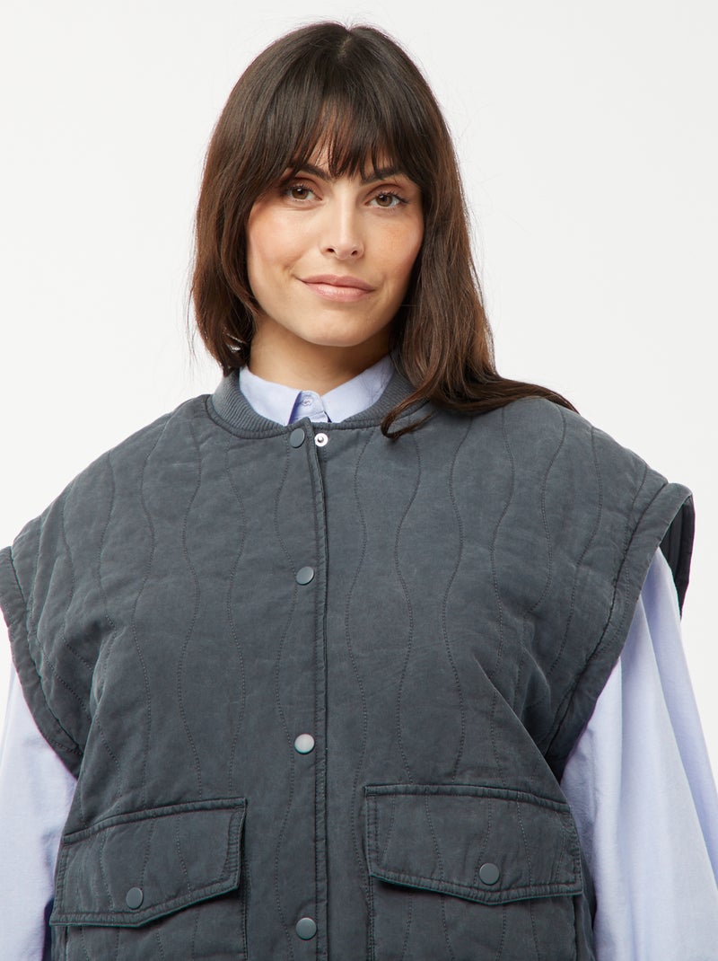 Giacca imbottita in cotone con onde verticali NERO - Kiabi