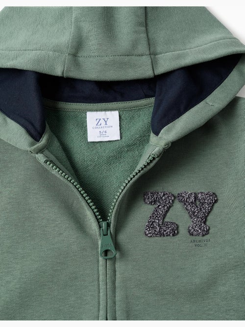 Giacca in cotone con cappuccio con ricamo bouclé zy - Kiabi Giacca in cotone con cappuccio con ricamo bouclé zy - Kiabi