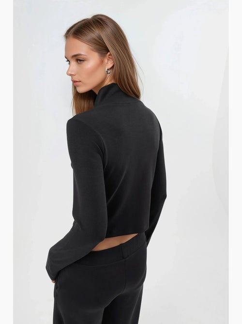 Giacca in maglia aderente con chiusura a zip busem - Kiabi Giacca in maglia aderente con chiusura a zip busem - Kiabi