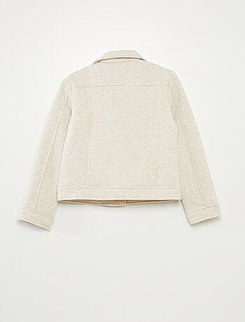 Giacca in maglia con apertura con zip asimmetrica