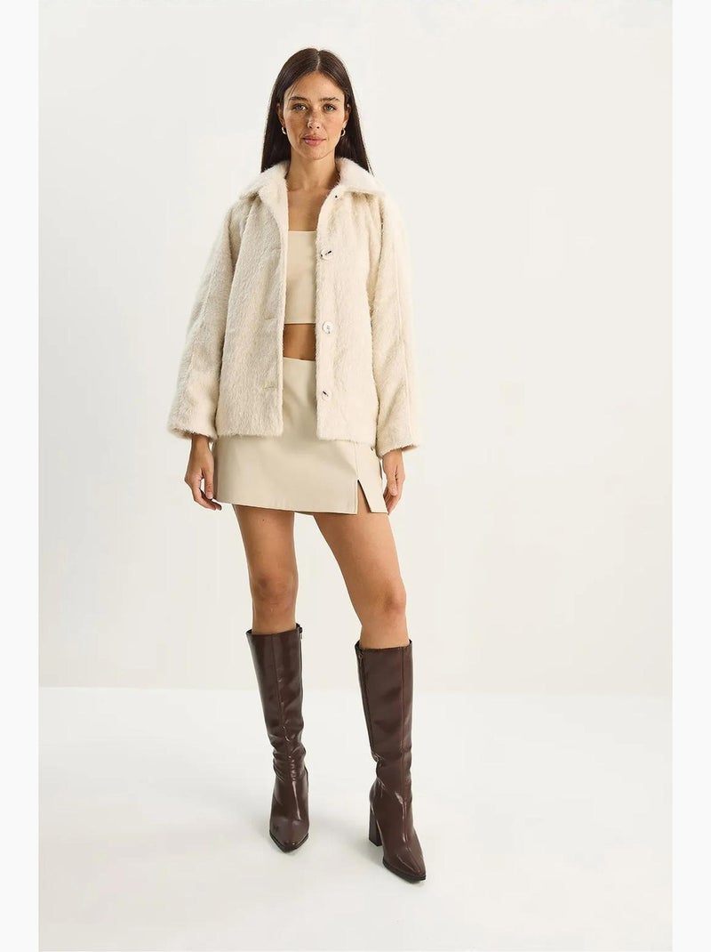Giacca oversize in peluche con chiusura a bottoni lucci Crema - Kiabi