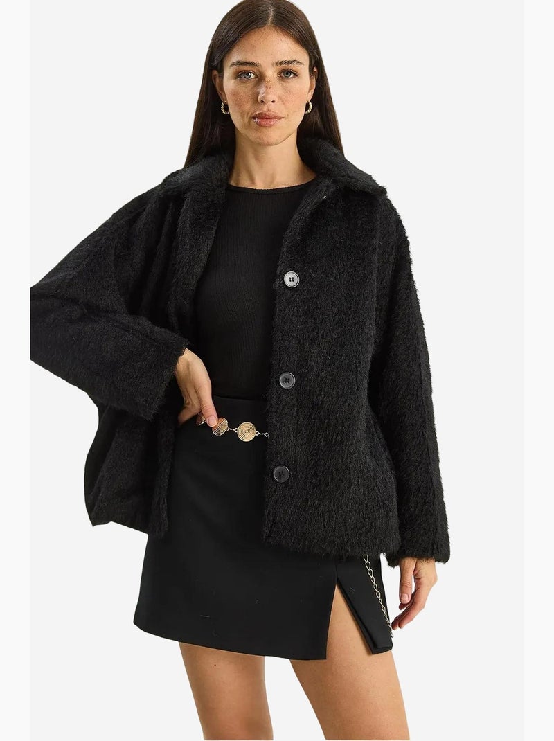Giacca oversize in peluche con chiusura a bottoni lucci Nero - Kiabi