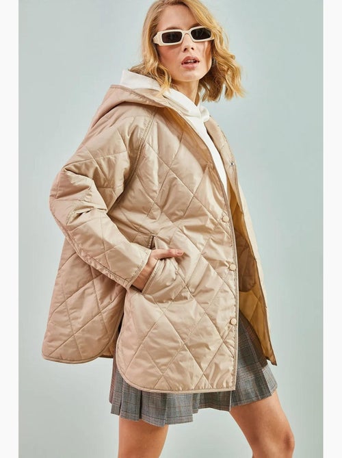 Giacca trapuntata oversize con cappuccio lucci - Kiabi Giacca trapuntata oversize con cappuccio lucci - Kiabi